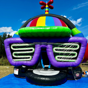 Best Bounce House Rental in Saint Cloud, FL Our DJ inflatable bouncer with sunglasses on top of it, LED ligts, Disco Lights and a speakers